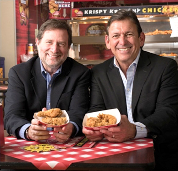 image of the founders holding chicken