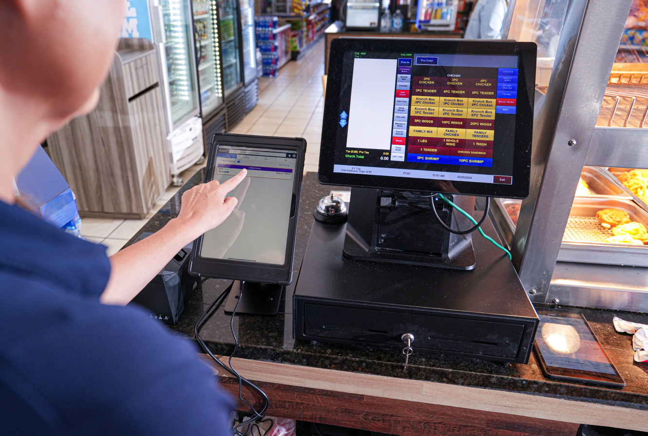 KKC worker using equipment to place order